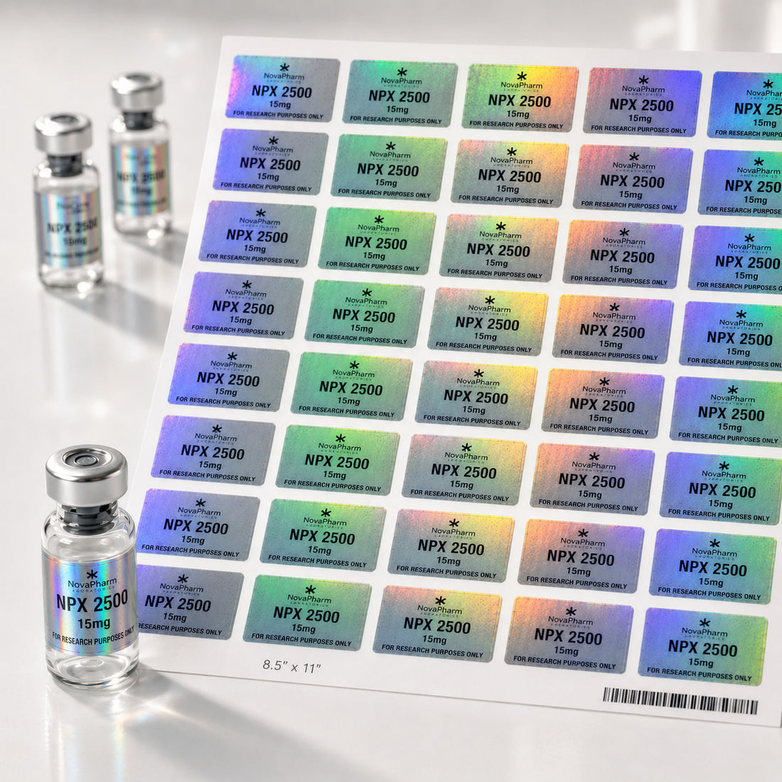 Custom holographic label sheets reflecting a rainbow finish on premium packaging