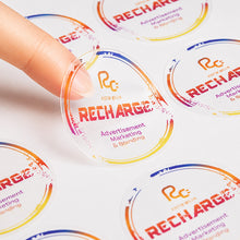 Transparent label sheets applied to clear glass jars and bottles